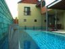 The tiles lap side ways and vertically to direct water into the pool.